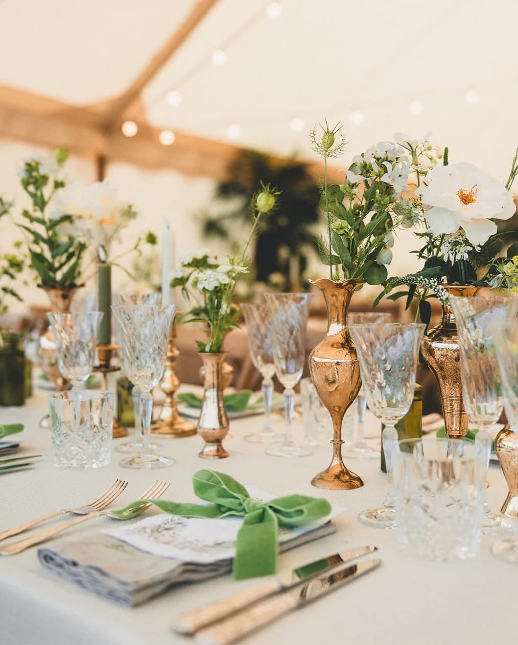 whimsical wedding tablescape with bow features and flowers