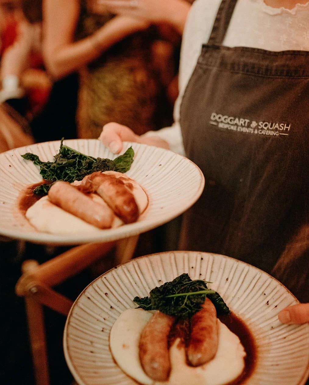 Doggart & Squash serving main wedding meal, bangers and mash