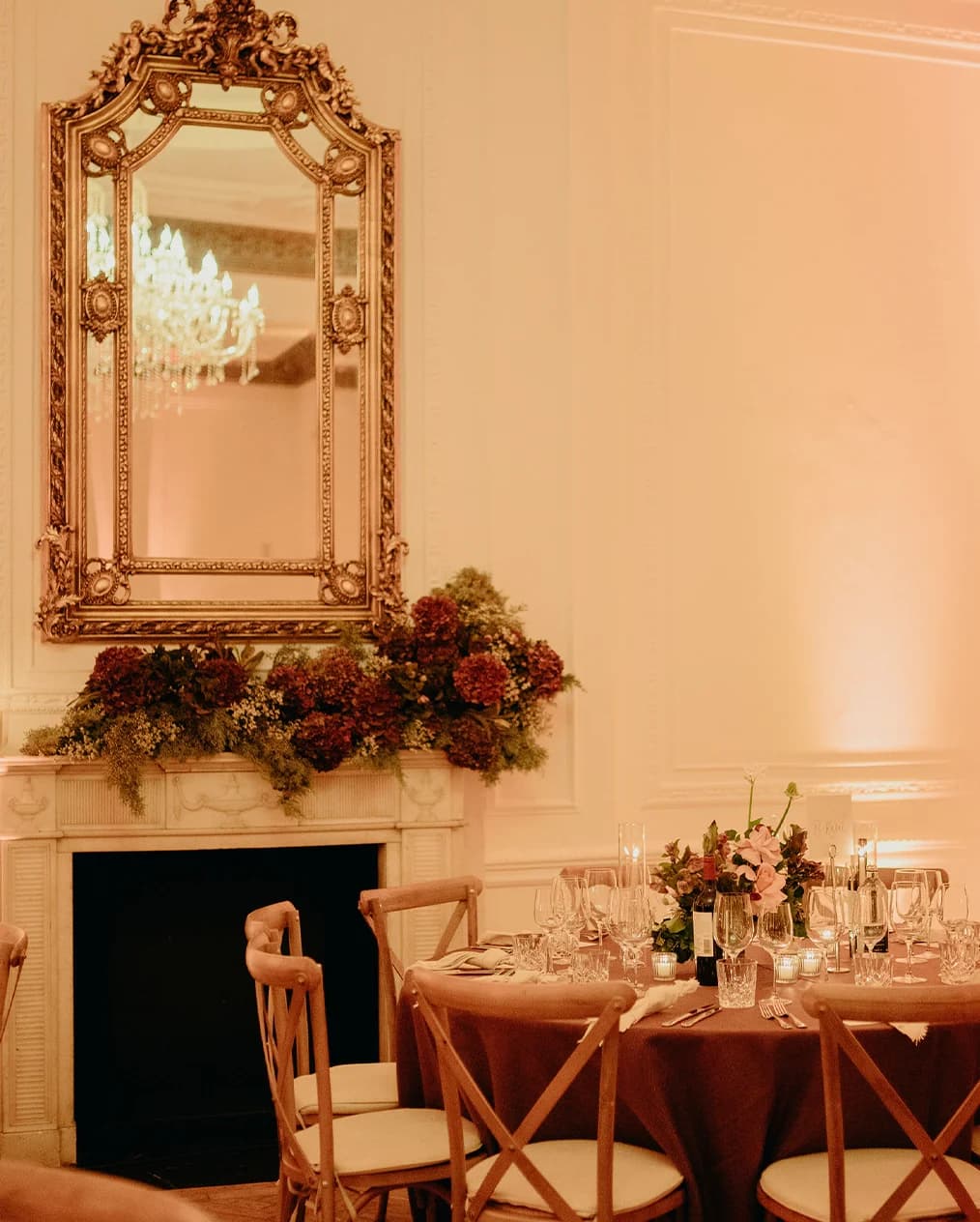 Winter wedding floral decor at The Belgravia featuring dark coloured flowers and foliage