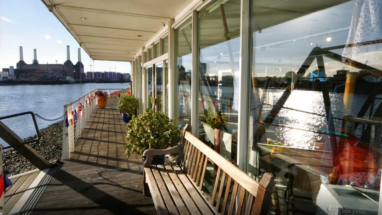Westminster Boating Base London wedding venue with riverside terrace, Thames views, and Battersea Power Station in the background
