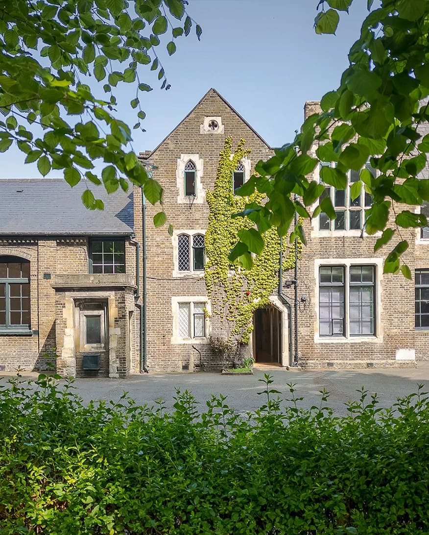 The Organ Factory London wedding venue exterior with historic brick building and ivy-covered façade