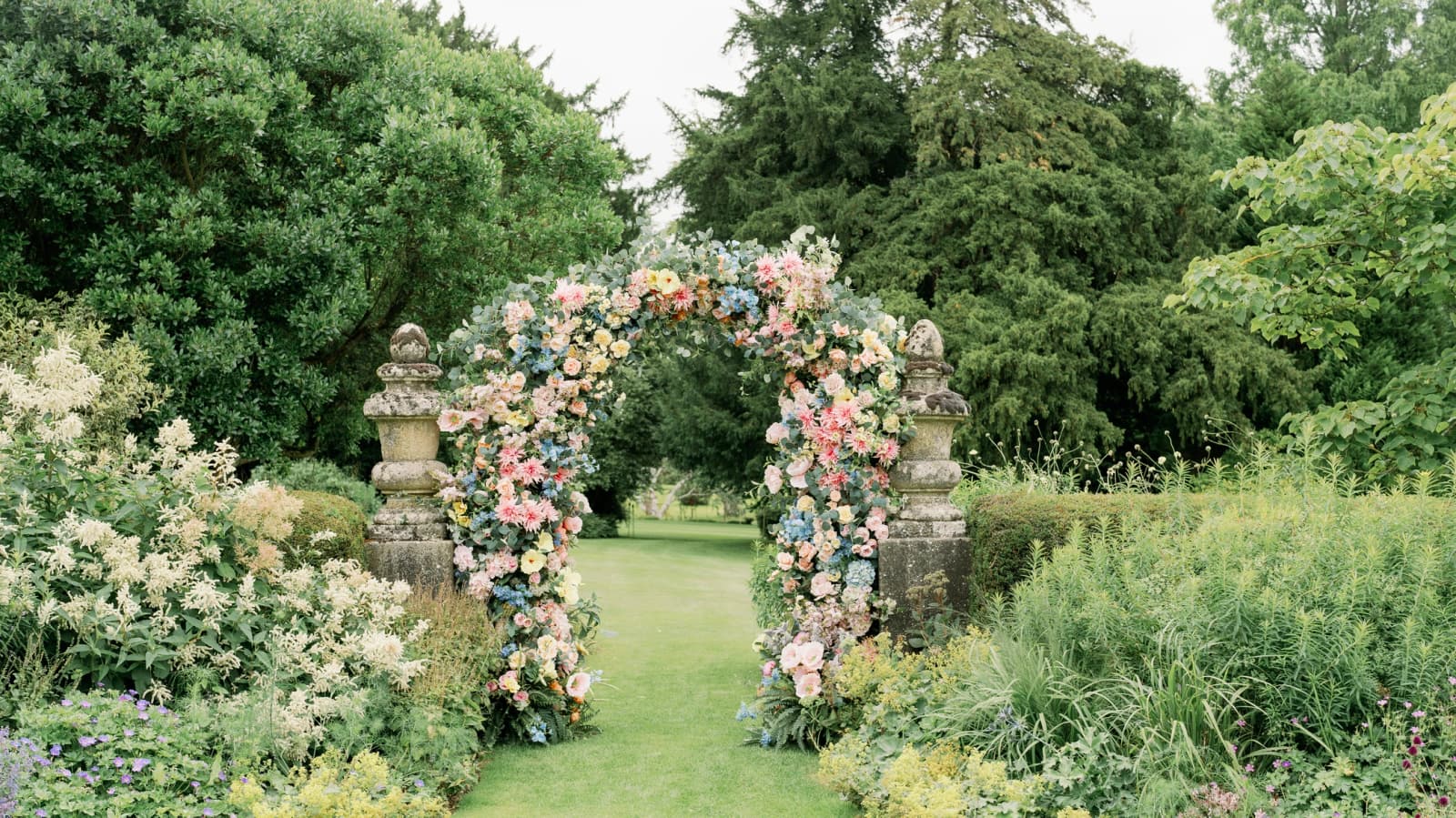 Wedding floral arch in family garden