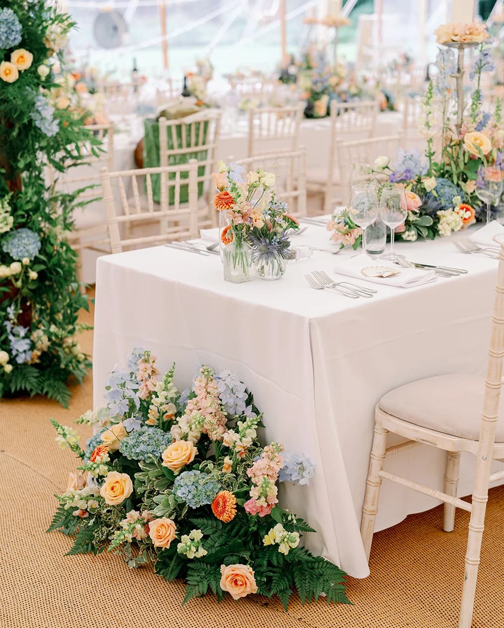 A wedding tables decorated with colourful flowers