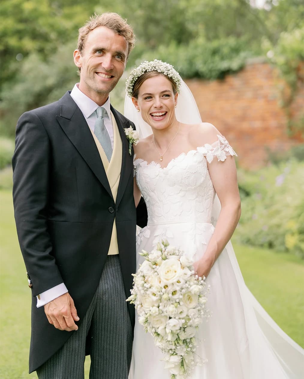 Rosie Tapner wearing Suzanne Neville gown 