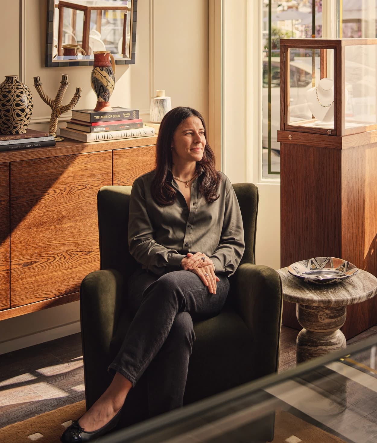 Sophie Breitmeyer sitting in her Belgravia studio