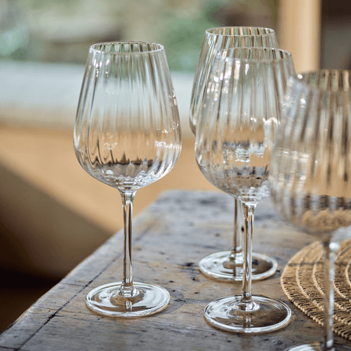 Image showing the Ribbed Set of 4 White Wine Glasses, Clear product.